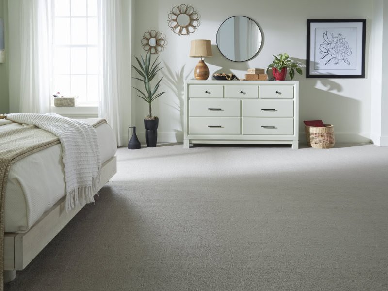 Choosing the right carpet color can significantly impact the overall ambiance of a room